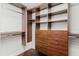 Custom closet features shelving, drawers and plenty of hanging space to keep your wardrobe organized at 1255 N Gulfstream Ave # 1104, Sarasota, FL 34236