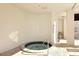 Relax at the community hot tub after a long day; the perfect way to unwind in a serene and private setting at 1255 N Gulfstream Ave # 1104, Sarasota, FL 34236