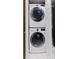 Convenient laundry closet with stacked washer and dryer at 1255 N Gulfstream Ave # 1104, Sarasota, FL 34236
