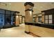 Elegant lobby with textured columns, granite counters, and tiled floors sets a welcoming tone at 1255 N Gulfstream Ave # 1104, Sarasota, FL 34236