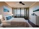 The main bedroom has gorgeous ocean views and a door leading to a private balcony at 1255 N Gulfstream Ave # 1104, Sarasota, FL 34236