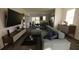 Inviting living room with contemporary decor, featuring an entertainment center and an open layout at 13137 Bayberry Way, Parrish, FL 34219