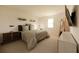 Bright bedroom featuring modern decor, neutral tones, and ample natural light creating a comfortable living space at 13141 Bayberry Way, Parrish, FL 34219