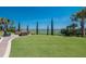 Backyard with a view of the lake and golf driving range at 13338 Torresina Ter, Lakewood Ranch, FL 34211
