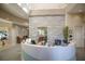 Lobby featuring a modern reception desk, clean white walls, and sleek design at 13338 Torresina Ter, Lakewood Ranch, FL 34211