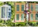 Aerial view of pickleball and bocce ball courts surrounded by lush landscaping at 13338 Torresina Ter, Lakewood Ranch, FL 34211