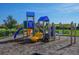 Community playground with colorful equipment, providing a fun and safe space for children at 13338 Torresina Ter, Lakewood Ranch, FL 34211