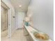 Inviting entryway with tile flooring, a stylish console table, and decorative accents at 13609 Messina Loop # 104, Bradenton, FL 34211