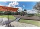 Community playground featuring play structures and seating area at 13609 Messina Loop # 104, Bradenton, FL 34211