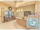 Reception area of a spa featuring modern decor, seating, large windows, and a healthy food display at 13609 Messina Loop # 104, Bradenton, FL 34211