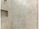 Close up of the neutral tile and built in shower shelf at 13609 Messina Loop # 104, Bradenton, FL 34211