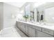 Bathroom features double vanity with plenty of counter space at 13871 Heartwood Way, Parrish, FL 34219