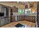 Bright kitchen with stainless appliances, granite countertops, and ample cabinetry at 1808 Coquina Dr, Sarasota, FL 34231