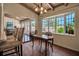 Cozy kitchen nook with brick-laid floors and outdoor view at 1808 Coquina Dr, Sarasota, FL 34231