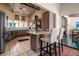 Charming kitchen boasts stainless steel appliances, brick accents, and bright lighting at 1808 Coquina Dr, Sarasota, FL 34231