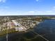 Wide aerial view of community, waterfront, and bay featuring gorgeous scenery at 2107 Palma Sola Blvd # 7, Bradenton, FL 34209