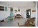 Comfortable carport seating area, perfect for outdoor enjoyment at 2107 Palma Sola Blvd # 7, Bradenton, FL 34209