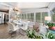Bright dining area with modern furniture and views of the outdoors at 2107 Palma Sola Blvd # 7, Bradenton, FL 34209