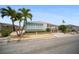Cozy single-story home with a carport and an American flag in a well-maintained neighborhood at 2107 Palma Sola Blvd # 7, Bradenton, FL 34209