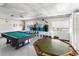Recreation room featuring a pool table and card table at 2107 Palma Sola Blvd # 7, Bradenton, FL 34209
