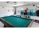 Spacious game room features a billiard table and cheerful nautical-themed decor at 2107 Palma Sola Blvd # 7, Bradenton, FL 34209