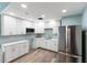 Bright kitchen featuring stainless steel appliances, quartz counters and ample cabinet space at 2107 Palma Sola Blvd # 7, Bradenton, FL 34209