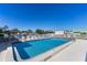 Enjoy a day by the community pool under clear blue skies at 2107 Palma Sola Blvd # 7, Bradenton, FL 34209
