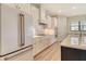 Modern kitchen showcases stainless steel appliances, sleek cabinetry, and a functional island at 2469 Paradise Plum Dr, Sarasota, FL 34240
