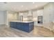 Beautiful kitchen with stainless appliances, a large kitchen island, and custom cabinetry at 2469 Paradise Plum Dr, Sarasota, FL 34240