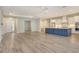 Open-concept living area with a gourmet kitchen and spacious floor plan at 2469 Paradise Plum Dr, Sarasota, FL 34240
