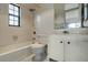 Well-lit bathroom features a shower and vanity with ample storage space at 2727 75Th W St # 1Af, Bradenton, FL 34209