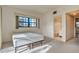 Bright bedroom adjacent to bathroom with natural light from the large window at 2727 75Th W St # 1Af, Bradenton, FL 34209