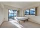 Bright bedroom with sliding glass doors and large window offers natural light at 2727 75Th W St # 1Af, Bradenton, FL 34209