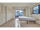 Bedroom with natural light, ample closet space, and sliding glass door access at 2727 75Th W St # 1Af, Bradenton, FL 34209