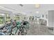Organized clubhouse bike room with bicycles and comfortable seating at 2727 75Th W St # 1Af, Bradenton, FL 34209