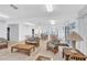 Inviting clubhouse lounge area with wicker furniture and natural lighting at 2727 75Th W St # 1Af, Bradenton, FL 34209