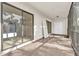 Enclosed porch featuring access to outdoor space and natural light at 2727 75Th W St # 1Af, Bradenton, FL 34209
