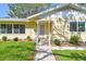Charming home with well-manicured lawn, inviting entrance, and tasteful landscaping at 3001 Bay Shore Cir, Sarasota, FL 34234