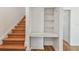 Hallway nook features built in desk with shelves, perfect for a small office at 3001 Bay Shore Cir, Sarasota, FL 34234
