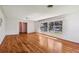 Open living room boasts hardwood floors and ample natural light at 3001 Bay Shore Cir, Sarasota, FL 34234