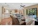 Spacious living area with hardwood floors and open floor plan at 306 Country Meadows Way, Bradenton, FL 34212
