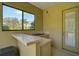 Backyard features outdoor kitchen area at 306 Country Meadows Way, Bradenton, FL 34212