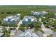 Aerial view of charming two-story homes surrounded by lush greenery in a beautiful community with a serene setting at 315 Sapphire Lake Dr # 101, Bradenton, FL 34209