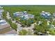 Aerial view of charming two-story homes surrounded by lush greenery, showcasing a beautiful community and serene setting at 315 Sapphire Lake Dr # 101, Bradenton, FL 34209