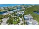 Breathtaking aerial view of a waterfront community, showcasing the unique layout and serene surroundings at 315 Sapphire Lake Dr # 101, Bradenton, FL 34209