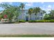 Charming two-story home with a welcoming porch and tropical landscaping, offering curb appeal and a serene entrance at 315 Sapphire Lake Dr # 101, Bradenton, FL 34209