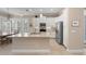 Modern kitchen with stainless steel appliances, white cabinetry, and a spacious island at 315 Sapphire Lake Dr # 101, Bradenton, FL 34209