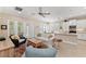 Inviting living area with comfortable seating, natural light, and an open connection to the kitchen at 315 Sapphire Lake Dr # 101, Bradenton, FL 34209