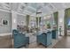 Inviting resident lounge featuring cozy seating, bright windows, and stylish décor at 315 Sapphire Lake Dr # 101, Bradenton, FL 34209