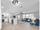 Open-concept floor plan with a modern kitchen, bright living space, and an inviting atmosphere at 3153 Irving St, Sarasota, FL 34237